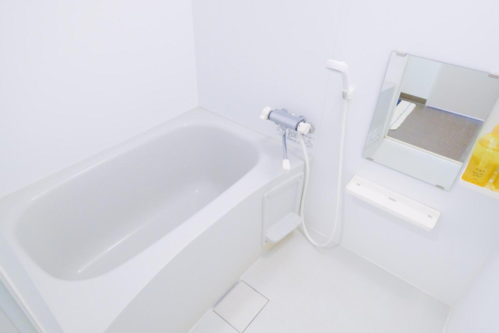 Good Life Apartment Naha Chambre photo